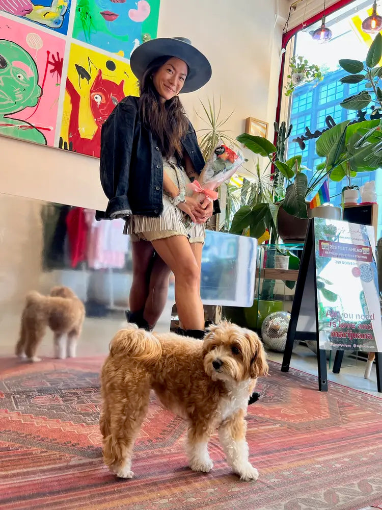 Mighty Lucky dispensary owner inside the store near NoHo NYC — licensed cannabis dispensary at 259 Bowery Manhattan with local art and welcoming atmosphere