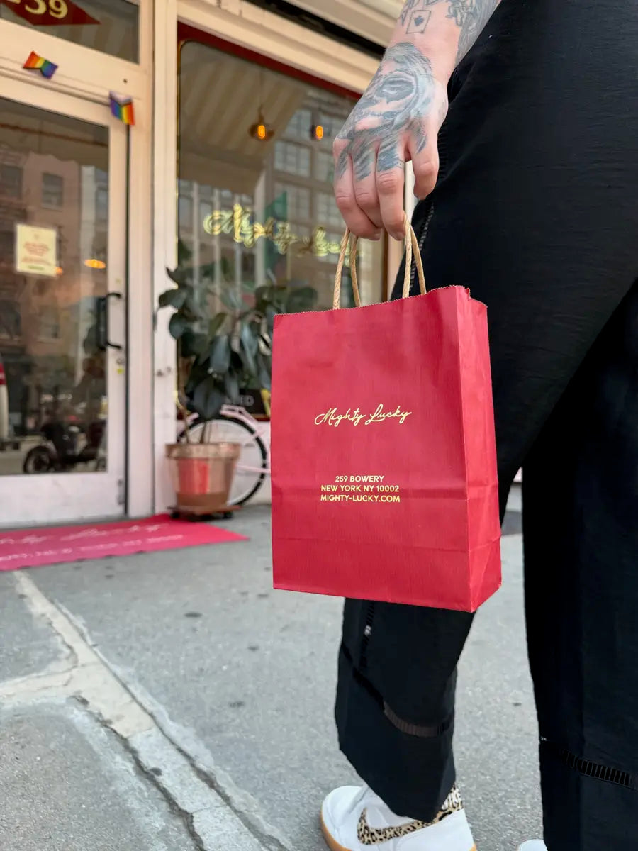 Mighty Lucky cannabis pickup bag outside 259 Bowery near Nolita NYC
